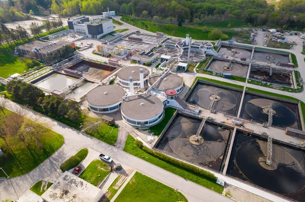 Aerial view of waste water treatment plant. Drinking tap water treatment process. Drinking bottle water production and distribution, filtration and cleaning.