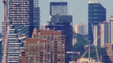 City of Toronto suffers through an unprecedented heat wave and heat haze caused by climate change. Hot summer time. Heatwave in North America. High temperatures and atmosphere distortion.