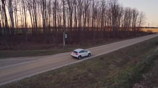 Aerial Shot Car Suv Driving Golden Hour Rural Road Vehicle — Stock video