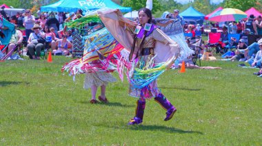 Pow Wow, 2nd Annual Two Spirit Powwow, by 2-Spirited People of the 1st Nations. Youth and women traditional dance in colourful dress: Toronto, Ontario, Canada - May 27, 2023.	