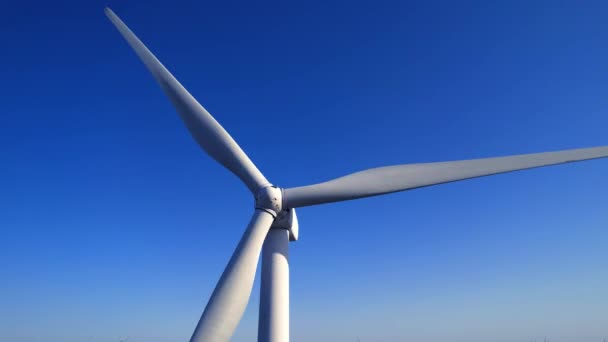 Aerial Close Shot Wind Mills Turbine Rotating Wind Generating Renewable — Video Stock