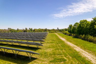 Solar power cells panels at power station in the field aerial. Green energy and ecology innovation for preservation of nature and avoid environment impact. Photovoltaic solar panels technologies clipart