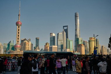 Shanghai, China 12.01.2024: Crowd of people in the Pudong District background. clipart