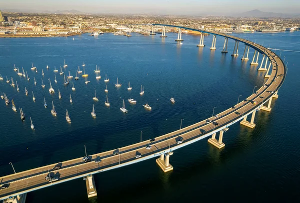 stock image Aerial view of Coronado Bridge in San Diego bay in southern California on a warm sunny day with boats in the bay and cars crossing the bridge