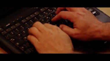 Close up video recording of laptop, notebook,mobile computer keyboard typing one or two hands or just one finger.