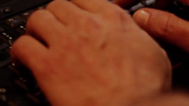 Close up video recording of laptop, notebook,mobile computer or desktop keyboard typing one or two hands or just one finger.