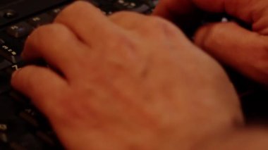 Close up video recording of laptop, notebook,mobile computer or desktop keyboard typing one or two hands or just one finger.
