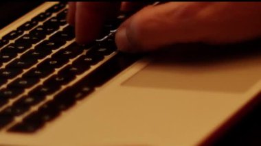 Close up video recording of laptop, notebook,mobile computer or desktop keyboard typing one or two hands or just one finger.