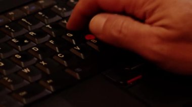 Close up video recording of laptop, notebook,mobile computer or desktop keyboard typing one or two hands or just one finger.