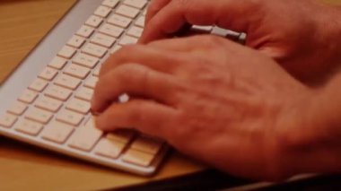 Close up video recording of laptop, notebook,mobile computer or desktop keyboard typing one or two hands or just one finger.