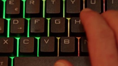 Close up video recording of laptop, notebook,mobile computer or desktop keyboard typing one or two hands or just one finger.