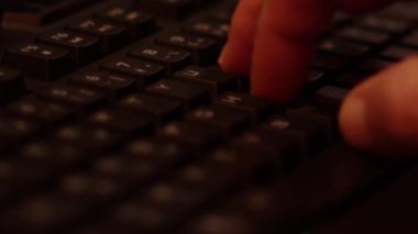Close up video recording of laptop, notebook,mobile computer or desktop keyboard typing one or two hands or just one finger.