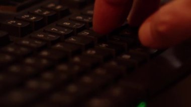 Close up video recording of laptop, notebook,mobile computer or desktop keyboard typing one or two hands or just one finger.