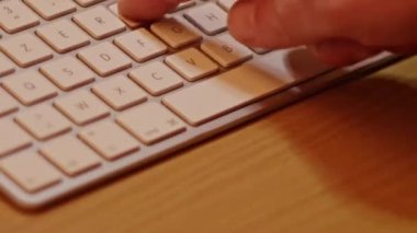 Close up video recording of laptop, notebook,mobile computer or desktop keyboard typing one or two hands or just one finger.