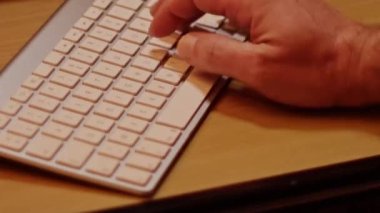 Close up video recording of laptop, notebook,mobile computer or desktop keyboard typing one or two hands or just one finger.