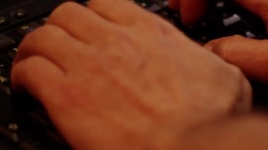 Close up video recording of laptop, notebook,mobile computer or desktop keyboard typing one or two hands or just one finger.