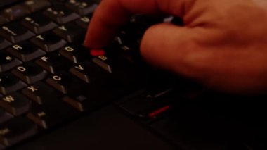 Close up video recording of laptop, notebook,mobile computer or desktop keyboard typing one or two hands or just one finger.