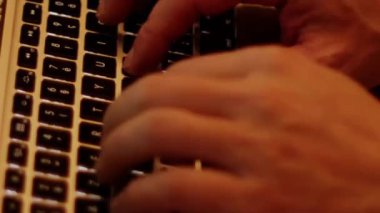 Close up video recording of laptop, notebook,mobile computer or desktop keyboard typing one or two hands or just one finger.