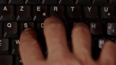 Close up video recording of laptop, notebook,mobile computer or desktop keyboard typing one or two hands or just one finger.