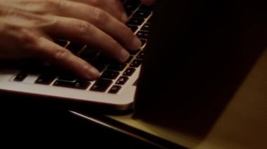 Close up video recording of laptop, notebook,mobile computer or desktop keyboard typing one or two hands or just one finger.