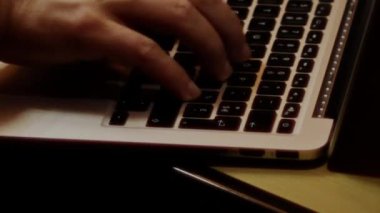 Close up video recording of laptop, notebook,mobile computer or desktop keyboard typing one or two hands or just one finger.