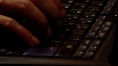Close up video recording of laptop, notebook,mobile computer or desktop keyboard typing one or two hands or just one finger.