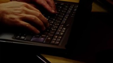 Close up video recording of laptop, notebook,mobile computer or desktop keyboard typing one or two hands or just one finger.