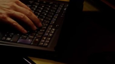 Close up video recording of laptop, notebook,mobile computer or desktop keyboard typing one or two hands or just one finger.