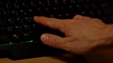 Close up video recording of laptop, notebook,mobile computer or desktop keyboard typing one or two hands or just one finger.