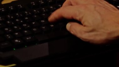 Close up video recording of laptop, notebook,mobile computer or desktop keyboard typing one or two hands or just one finger.