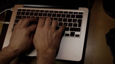 Close up video recording of laptop, notebook,mobile computer or desktop keyboard typing one or two hands or just one finger.
