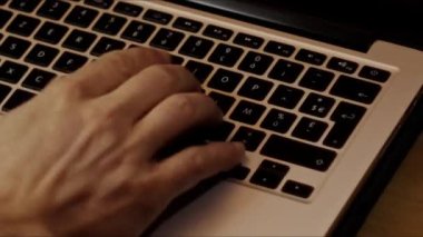 Close up video recording of laptop, notebook,mobile computer or desktop keyboard typing one or two hands or just one finger.