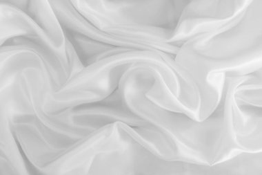 Yumuşak dalgalı beyaz bez arkaplan, pıhtının yakın dokusu