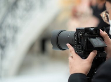 Fotoğrafçı, kamera kullanan adam, meslek sahibi.