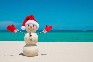 Kardan adam. Kırmızı Noel Baba şapkalı ve eldivenli kardan adam. Mutlu Noeller ve mutlu yıllar. Sandy Snowman sahilde. Gülümseyen kardan adam. Miami Beach Florida 'da. Kış Tatili 'ni kutluyoruz. Xmas kartpostalları