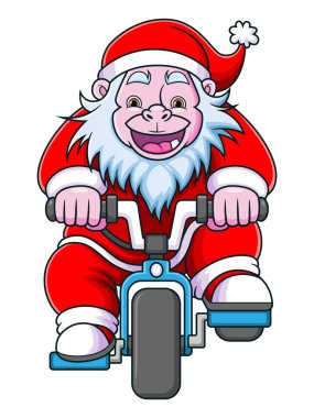 Mutlu yeti cücesi Noel Baba kostümüyle oynuyor ve resimli bisikleti sürüyor.