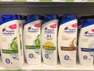 22.01.2023 Ukraine, Kharkiv, a shelf in a supermarket with hair shampoos: Head Shoulders shampoo in hair care products line in supermarket.