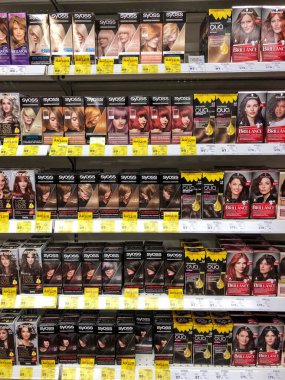 22.01.2023 Ukraine, Kharkiv, cosmetics and hair care store. Large selection of hair dye from different brands. Stand with women's hair dye