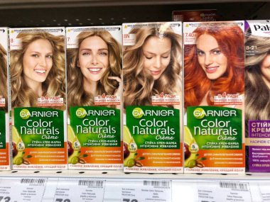 22.01.2023 Ukraine, Kharkiv, cosmetics and hair care store. Large selection of hair dye from different brands. Stand with women's hair dye