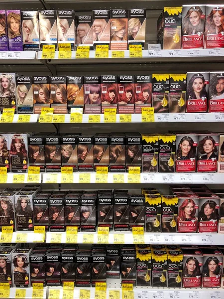 22.01.2023 Ukraine, Kharkiv, cosmetics and hair care store. Large selection of hair dye from different brands. Stand with women's hair dye