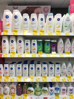 12.03.2023 Ukraine, Kharkov Large range of Nivea brand shower gels on the shelves of a cosmetic store clipart