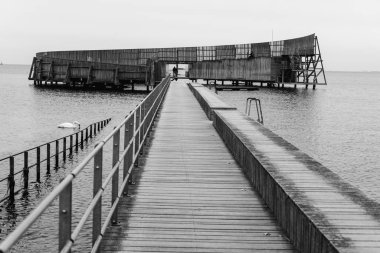 Embankment with architectural wooden structure. Denmark. Copenhagen.