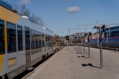Railway transport. The train is on the platform.