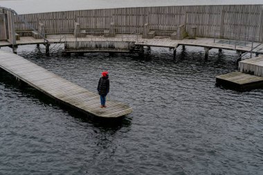 Travel. A woman walks around the city of Copenhagen. Denmark.