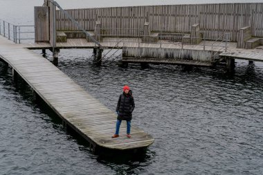 Travel. A woman walks around the city of Copenhagen. Denmark.