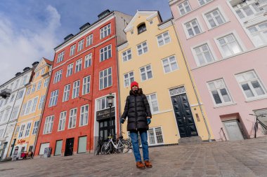 Travel. A woman walks around the city of Copenhagen. Denmark.