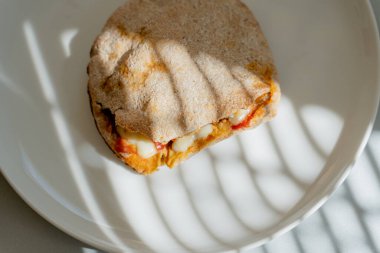 Breakfast. Sandwiches with cheese and tomatoes.