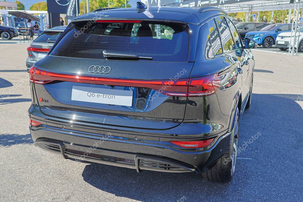 Showing the design and lines of the newest electric suv from audi, the q6 e tron