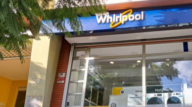 Whirlpool store selling home appliances like washing machines and dishwashers clipart