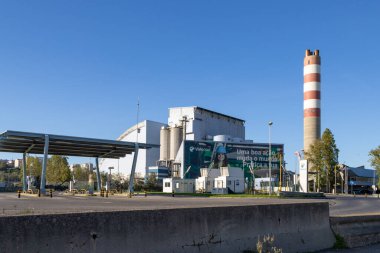 Valorsul waste to energy plant stands tall, showcasing its commitment to sustainable waste management and recycling practices in portugal clipart